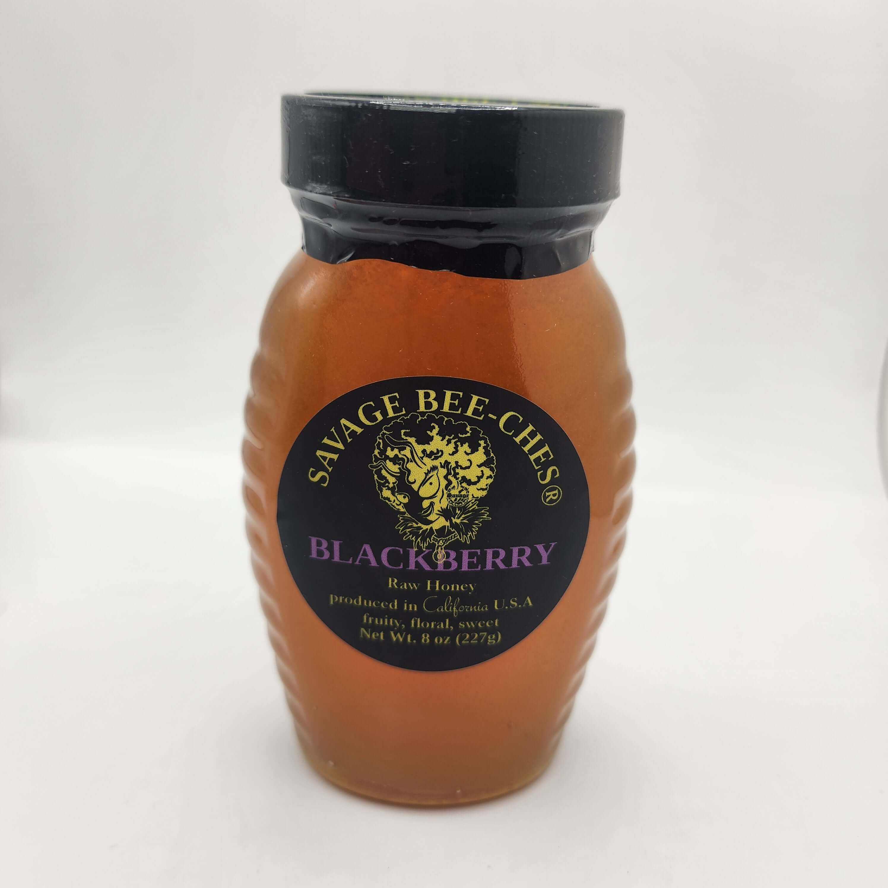 California Blackberry Honey by Savage Bee-Ches in a jar, showcasing fruity floral sweetness and wild flavors.